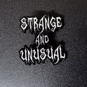Strange and Unusual Enamel Pin (NWT)